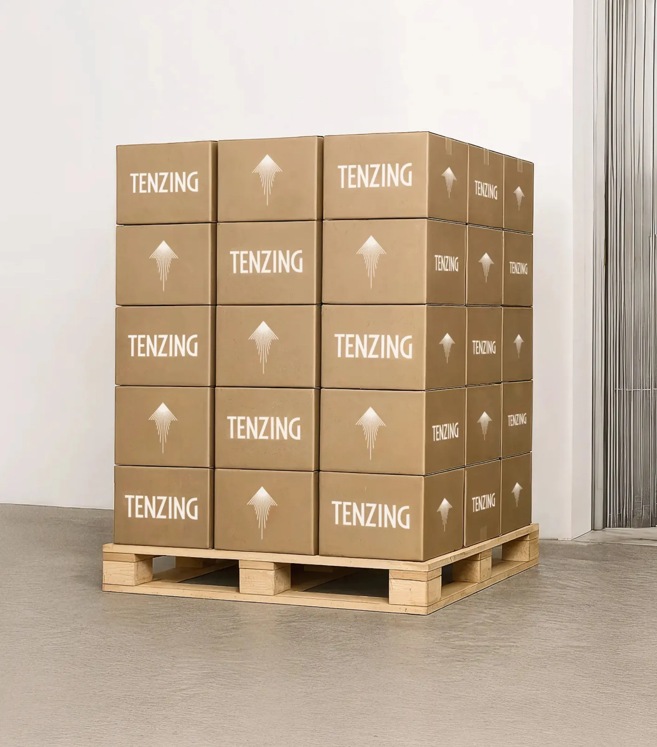 A pallet stacked with Tenzing boxes.